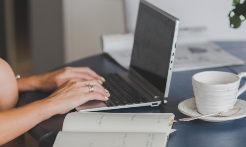 The essence of exceptional living a person working on a laptop